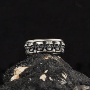 The Mens Skull Wedding Ring is a product of high class craftsmanship and intricate designing. It's solid structure makes it a perfect piece to use as an everyday jewelry to elevate your style.