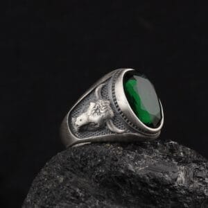 bull ring with green emerald gemstone