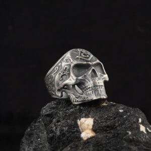 masonic skull ring is a jewelry shaped as a skull and at the head of the skull there is a symbol of freemasonry
