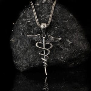 the caduceus necklace is a product of high class craftsmanship and intricate designing. it's solid structure makes it a perfect piece to use as an everyday jewelry to elevate your style.