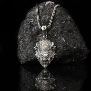 bison necklace is a sterling silver jewelry piece that shaped as a head of a bison.