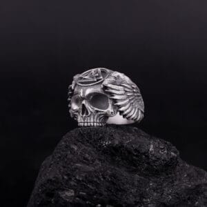 The skull of odin ring represents Odin as a god of death, as does the Valknut on his head. Ravens represent Odin's welcoming to Valhalla, in total this was the symbol of the Battle field & Valhalla, the hall in Asgard where Odin took fallen warriors in the afterlife. There the warriors would live until they were called on to fight alongside the gods during Ragnarok.
