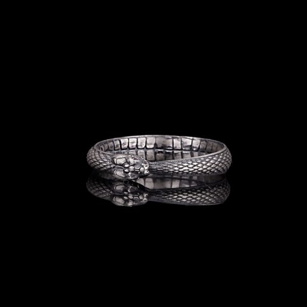 the ouroboros ring sterling silver is a product of high class craftsmanship and intricate designing. it's solid structure makes it a perfect piece to use as an everyday jewelry to elevate your style. espada silver