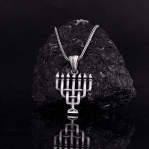 The silver Menorah necklace is a perfect gift for your Jewish friend, Fiancée etc.. & it is a product of high class craftsmanship and intricate designing.